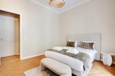 Un ou plusieurs lits dans un hébergement de l'établissement Sublime apartment - 2BR-4P - Arc de Triomphe