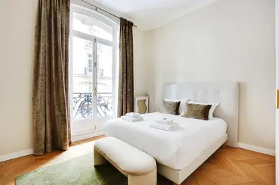 Un ou plusieurs lits dans un hébergement de l'établissement Sublime apartment - 2BR-4P - Arc de Triomphe