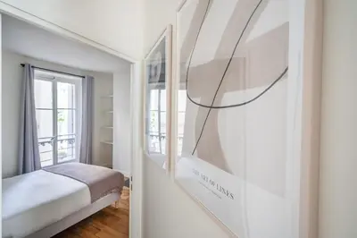 Un ou plusieurs lits dans un hébergement de l'établissement 2#Two Bedrooms#Champs Elysées#Arc de Triomphe#AC