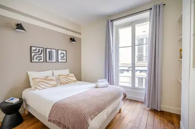 Un ou plusieurs lits dans un hébergement de l'établissement 3#Two Bedrooms#Champs Elysées#Arc de Triomphe#AC