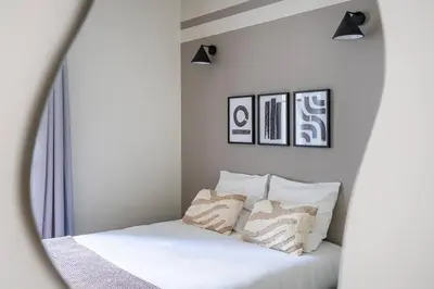 Un ou plusieurs lits dans un hébergement de l'établissement 3#Two Bedrooms#Champs Elysées#Arc de Triomphe#AC