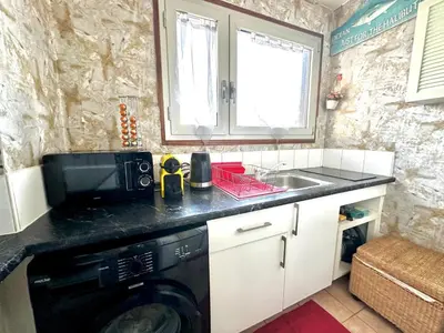 Cuisine ou kitchenette dans l'établissement Sweet Home Montrouge