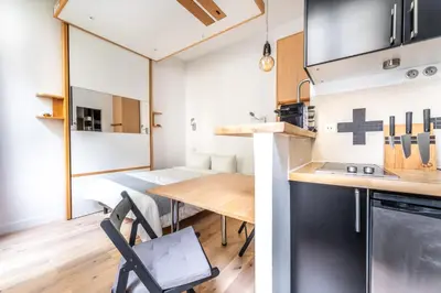 Cuisine ou kitchenette dans l'établissement Matignon Cozy Flat