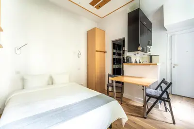 Cuisine ou kitchenette dans l'établissement Matignon Cozy Flat