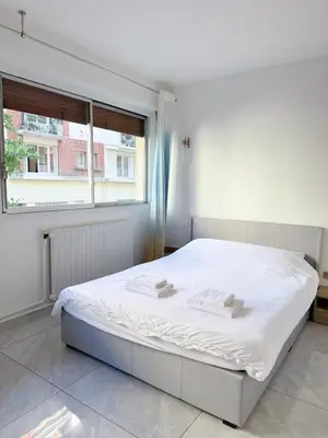 Un ou plusieurs lits dans un hébergement de l'établissement Elegant and Comfortable Studio Jouvenet