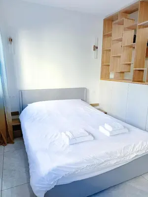 Un ou plusieurs lits dans un hébergement de l'établissement Elegant and Comfortable Studio Jouvenet