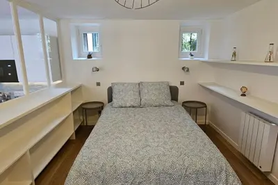 Un ou plusieurs lits dans un hébergement de l'établissement Appartement - Tour Eiffel