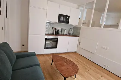 Cuisine ou kitchenette dans l'établissement Appartement - Tour Eiffel