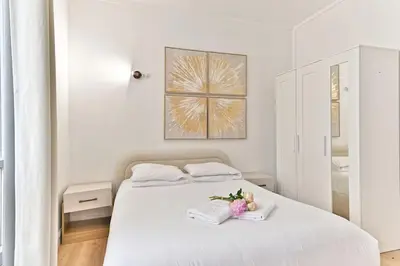 Un ou plusieurs lits dans un hébergement de l'établissement Studio paisible Parc des Buttes-Chaumont