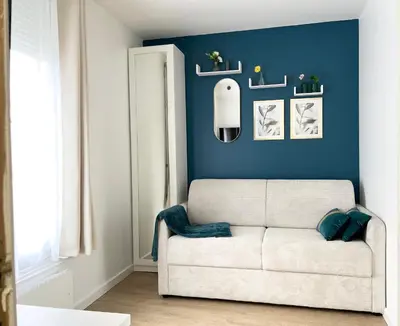 Coin salon dans l'établissement Cosy studio aux portes de Paris
