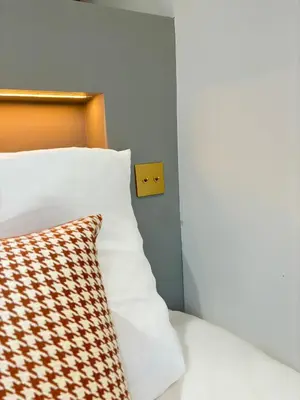 Un ou plusieurs lits dans un hébergement de l'établissement Hotel Paris Amore