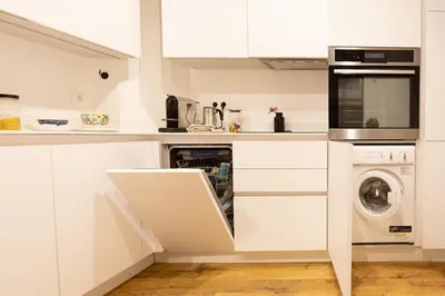 Cuisine ou kitchenette dans l'établissement La Sorbonne Fleurie