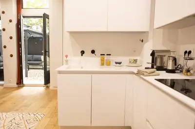 Cuisine ou kitchenette dans l'établissement La Sorbonne Fleurie