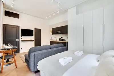 Un ou plusieurs lits dans un hébergement de l'établissement Magnifique Studio Montorgueil