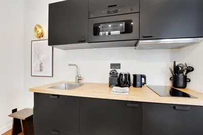Cuisine ou kitchenette dans l'établissement Magnifique Studio Montorgueil