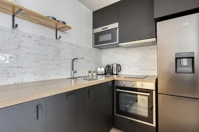 Cuisine ou kitchenette dans l'établissement Modern & Pleasant Flat in the Heart of the 15th