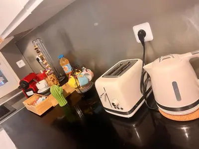 Cuisine ou kitchenette dans l'établissement Résidence lux Paris Expo Porte de Versailles