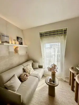 Coin salon dans l'établissement Séjour parisien Suite Bastille