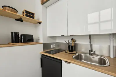 Cuisine ou kitchenette dans l'établissement Studio de Charme au Cœur de Paris!