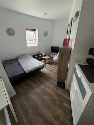 Télévision ou salle de divertissement dans l'établissement Studio Paris 16