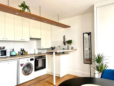 Cuisine ou kitchenette dans l'établissement Eiffel Tower - Cosy Studio