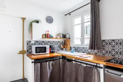 Cuisine ou kitchenette dans l'établissement GuestReady - Bel Apt. au cœur de Paris