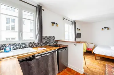 Cuisine ou kitchenette dans l'établissement GuestReady - Bel Apt. au cœur de Paris