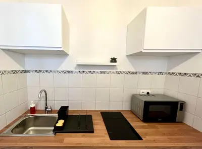 Cuisine ou kitchenette dans l'établissement Spacieux duplex parisien rénové, proche Tour Eiffel