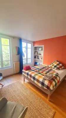 Un ou plusieurs lits dans un hébergement de l'établissement Superbe Maison près du Sacré Cœur