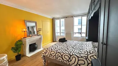 Un ou plusieurs lits dans un hébergement de l'établissement Superbe Maison près du Sacré Cœur