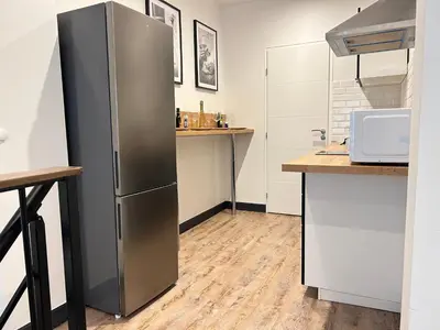 Cuisine ou kitchenette dans l'établissement Love room in Paris