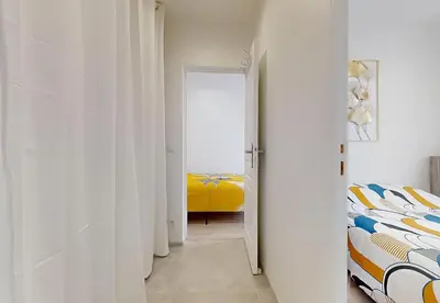 Un ou plusieurs lits dans un hébergement de l'établissement Magnifique 3Pièces Paris Expo Pte de Versailles Dôme de Paris