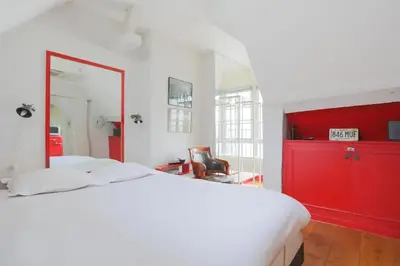 Un ou plusieurs lits dans un hébergement de l'établissement Cosy flat Saint-Michel - Seine