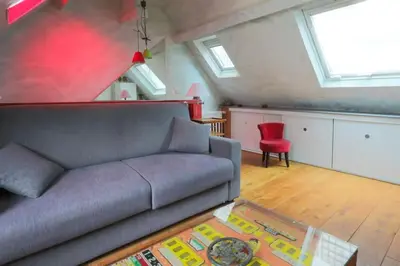 Coin salon dans l'établissement Cosy flat Saint-Michel - Seine