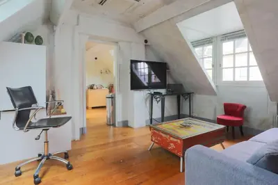 Télévision ou salle de divertissement dans l'établissement Cosy flat Saint-Michel - Seine