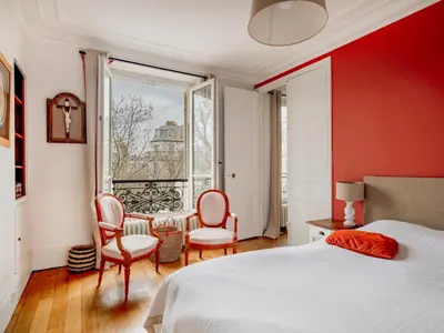 Un ou plusieurs lits dans un hébergement de l'établissement Paris Arc de Triomphe Residence