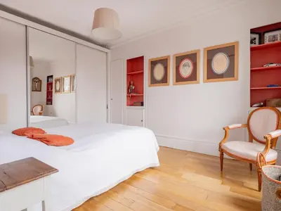 Un ou plusieurs lits dans un hébergement de l'établissement Paris Arc de Triomphe Residence