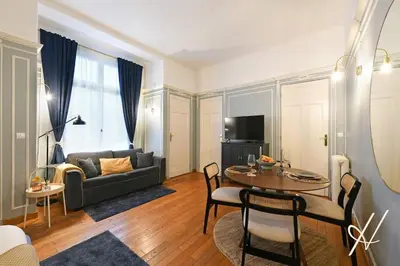 Télévision ou salle de divertissement dans l'établissement Top Location 4P Studio - Champs-Elysées Best Stay