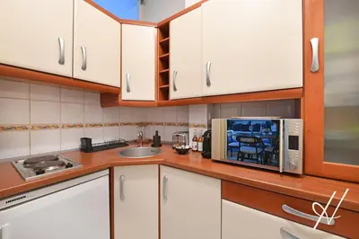 Cuisine ou kitchenette dans l'établissement Top Location 4P Studio - Champs-Elysées Best Stay