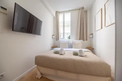 Un ou plusieurs lits dans un hébergement de l'établissement CIA - Amazing loft bastille
