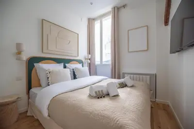 Un ou plusieurs lits dans un hébergement de l'établissement CIA - Amazing loft bastille