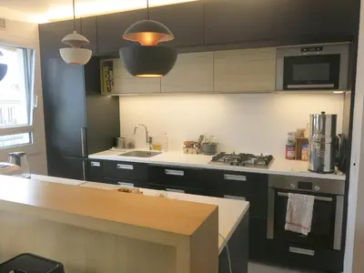 Cuisine ou kitchenette dans l'établissement Appartement St Antoine Nation CityCosy