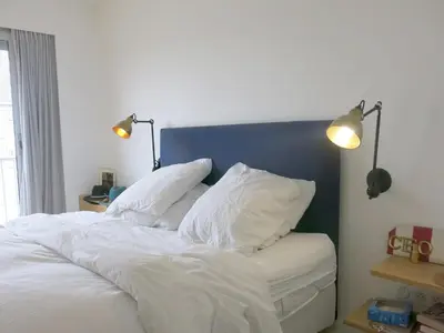 Un ou plusieurs lits dans un hébergement de l'établissement Appartement St Antoine Nation CityCosy
