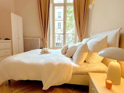 Un ou plusieurs lits dans un hébergement de l'établissement L'appartement Luxembourg