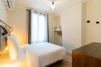 Un ou plusieurs lits dans un hébergement de l'établissement B1#Two Bedrooms#Champs Elysées#Arc de Triomphe#AC