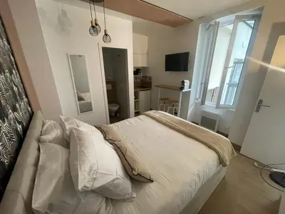 Un ou plusieurs lits dans un hébergement de l'établissement Eiffel tour Cosy Bali