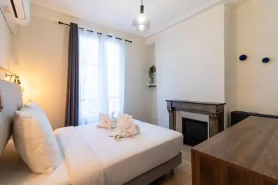 Un ou plusieurs lits dans un hébergement de l'établissement B2#Two Bedrooms#Champs Elysées#Arc de Triomphe#AC