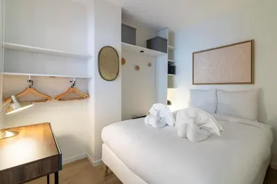 Un ou plusieurs lits dans un hébergement de l'établissement B3#Two Bedrooms#Champs Elysées#Arc de Triomphe#AC