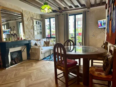 Coin salon dans l'établissement Appartement cosy