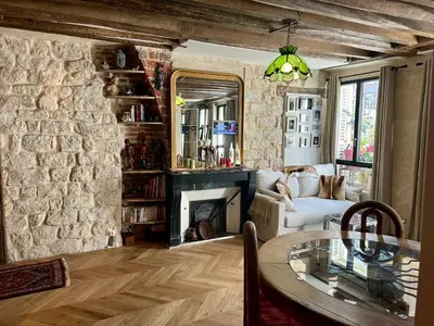 Coin salon dans l'établissement Appartement cosy